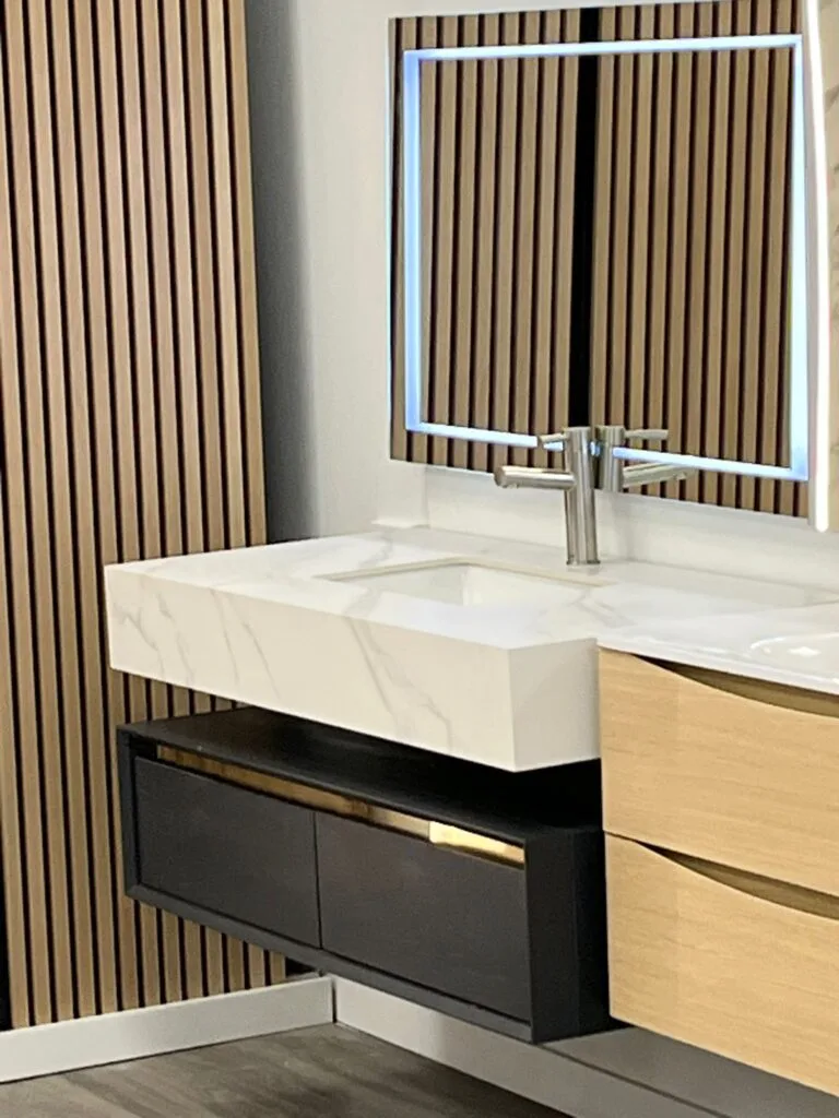 47-inch floating vanity with a marble countertop, dark cabinet, and LED mirror for modern bathroom spaces.