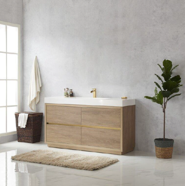 modern bathroom with a freestanding wood-finish vanity cabinet, white countertop, and gold accents.