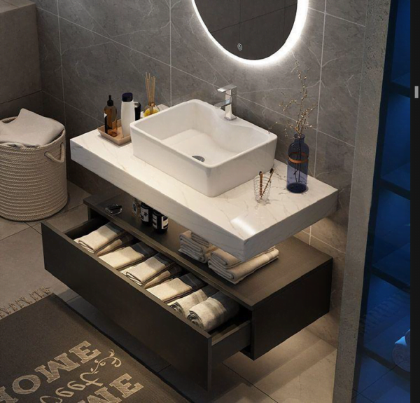 modern custom floating bathroom vanity with open drawer, white basin sink, and under-cabinet lighting.